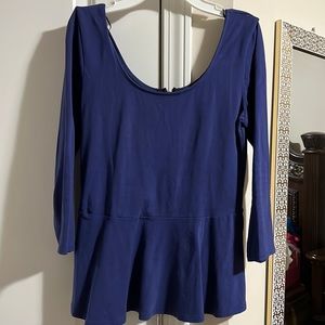 Blue peplum shirt with zipper in the back